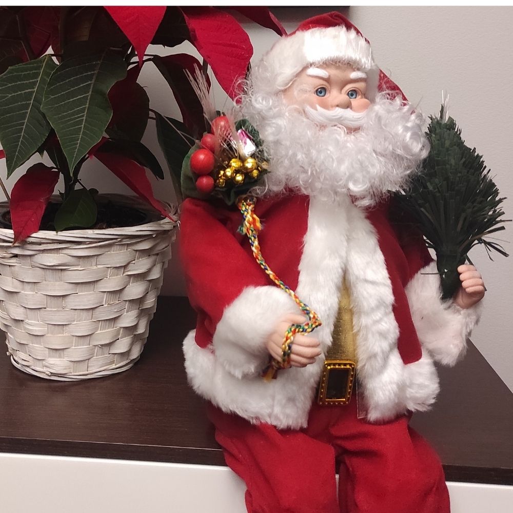 Pai Natal sentado com animação e luzes coloridas de fibra ótica