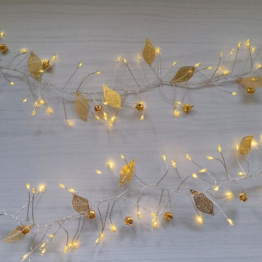 Guirnalda LED con Hojas y Cascabeles Dorados– 200 Luces cálidas, 1,5 m